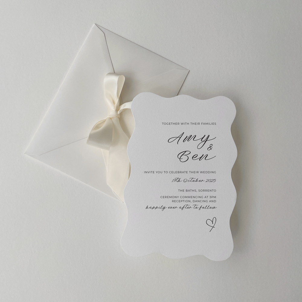 Amy wedding invitation suite by Ivory & Ink Weddings — simple and sweet, with soft flowing script and a delicate heart.