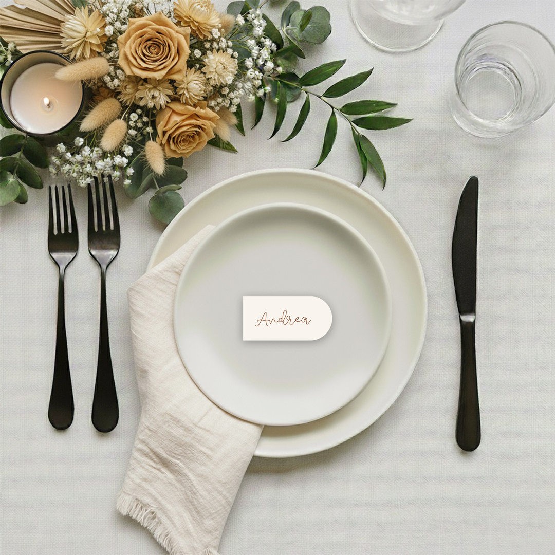 Ivory card stock place card in an arch shape with brown ink