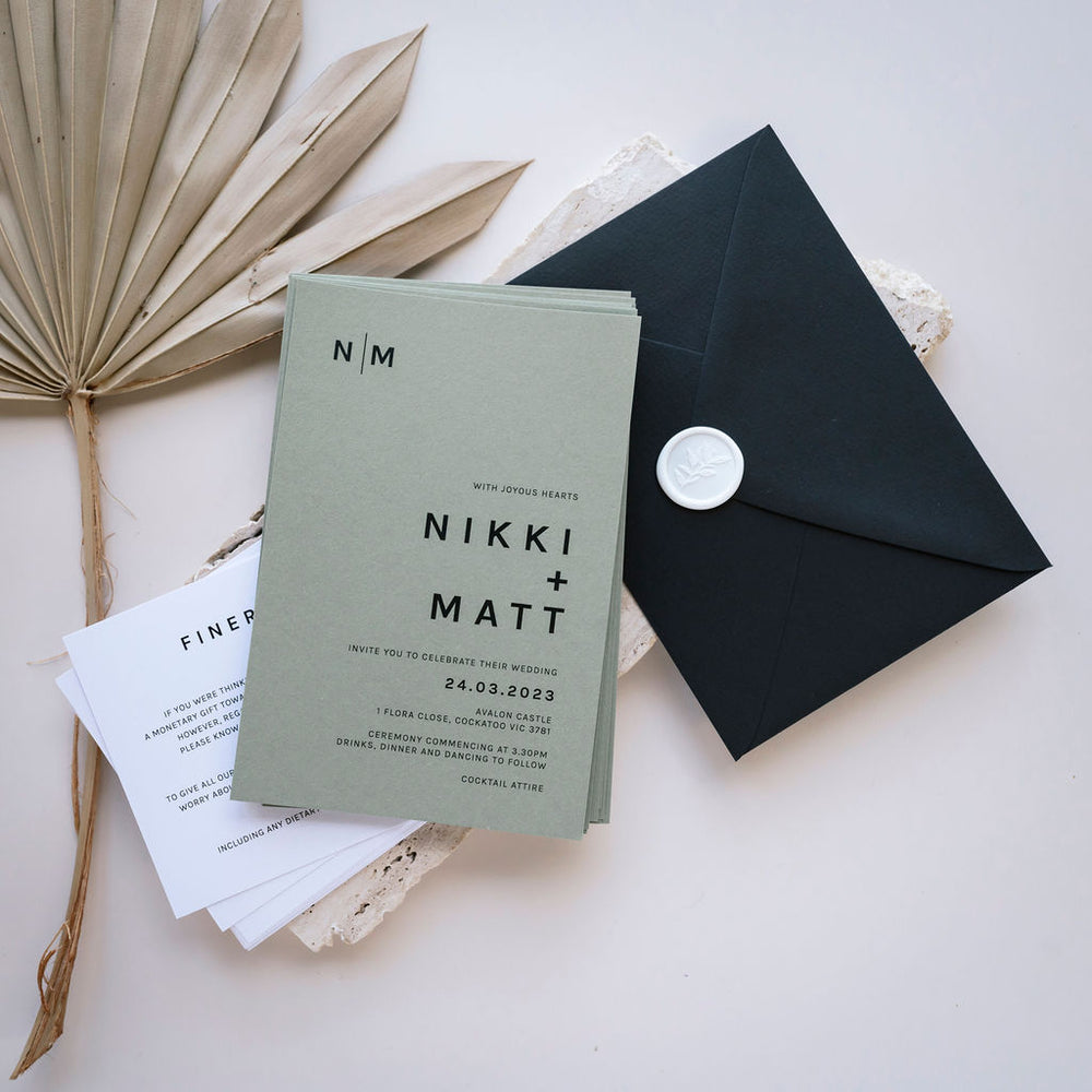 Fiona wedding invitation suite by Ivory & Ink Weddings — fresh and modern, with strong contemporary lettering paired with a sleek monogram.