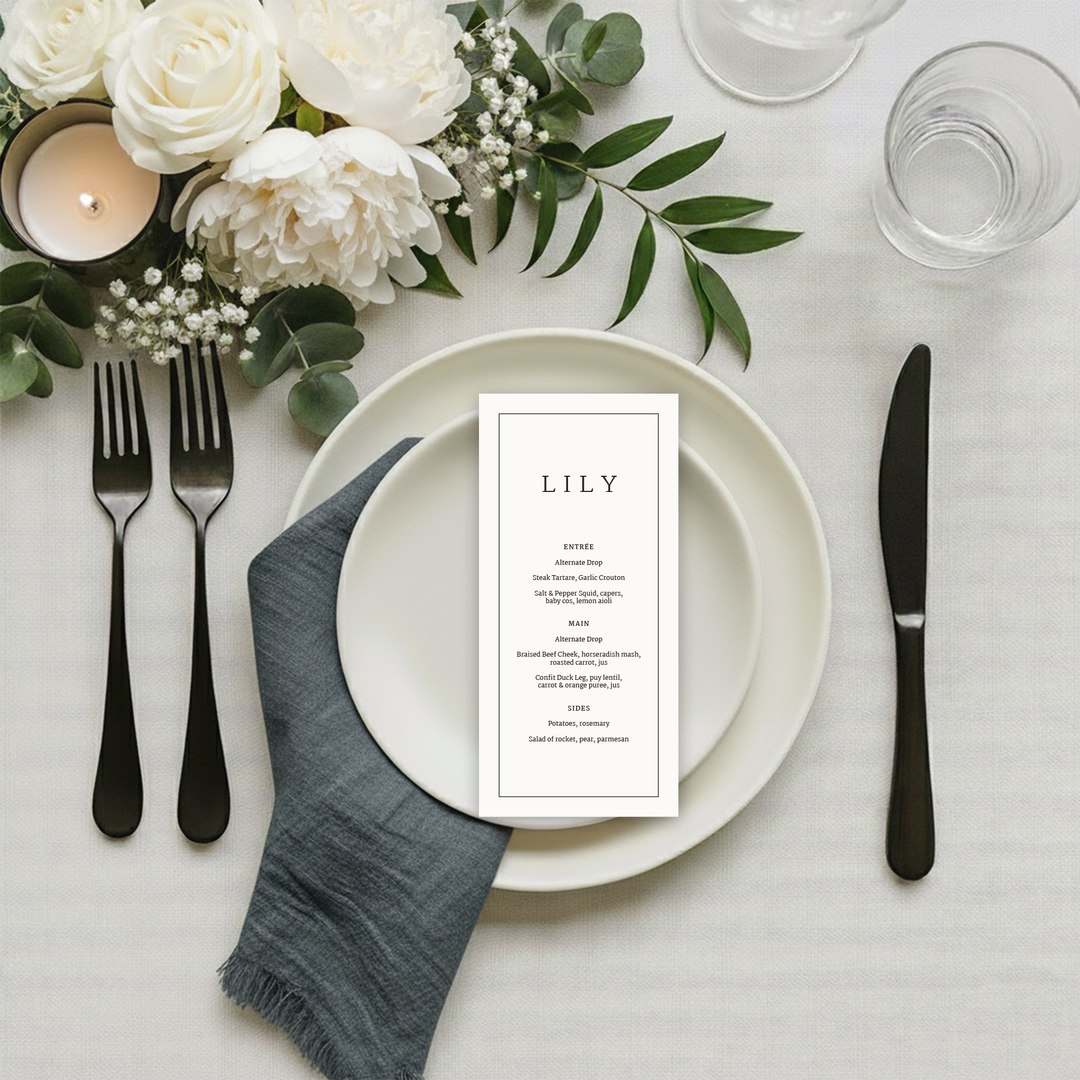 Personalised wedding menu with the couple's names and wedding date.