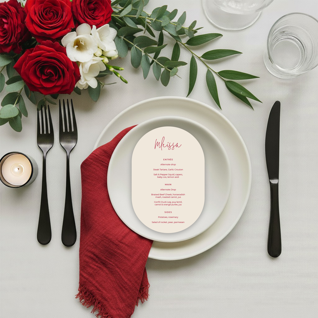 Modern wedding menu with a die-cut arch shape and textured paper.