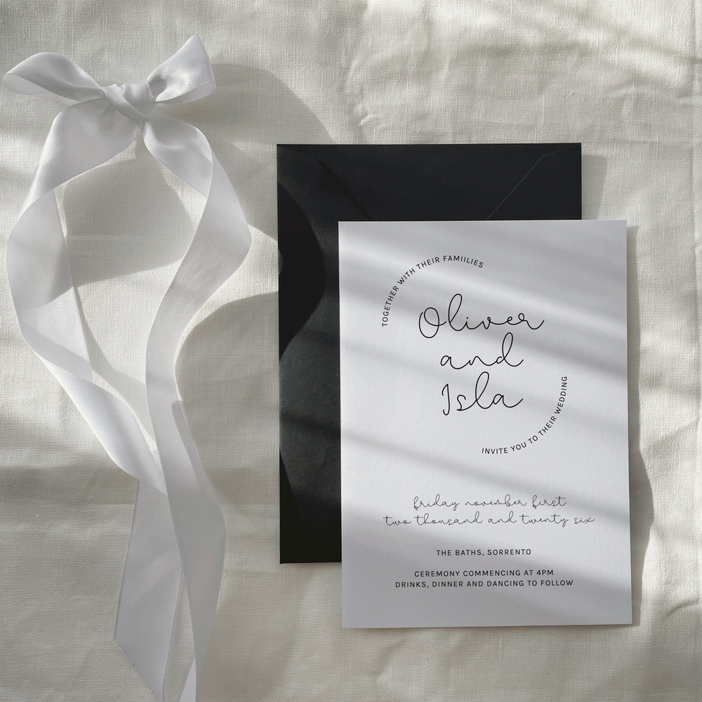 Isla wedding invitation suite by Ivory & Ink Weddings — relaxed and hand-drawn, with soft rounded lettering and an organic feel.